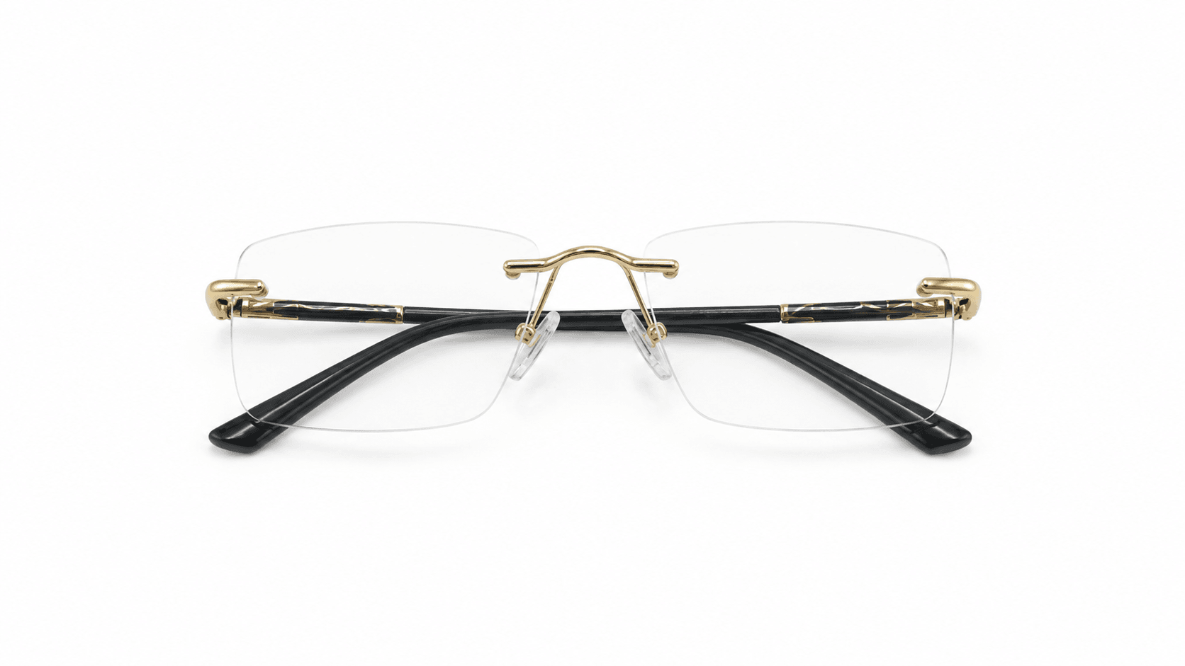 نظارة إنزو (Enzo) الطبية بدون إطار (Rimless) صناعة إيطالية بإطار معدني مستطيل باللون الأسود والذهبي، مناسبة للجنسين وللوجوه الدائرية والبيضاوية والقلبية.