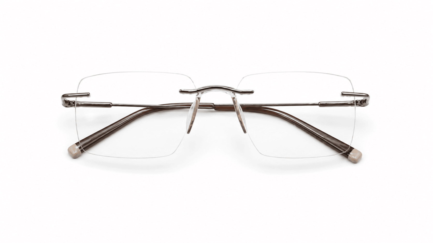 نظارة فاليو (Valio) الطبية بدون إطار (Rimless) بإطار مستطيل بلون برونز، مناسبة للجنسين وتلائم الوجوه الدائرية والبيضاوية والقلبية والمربعة.