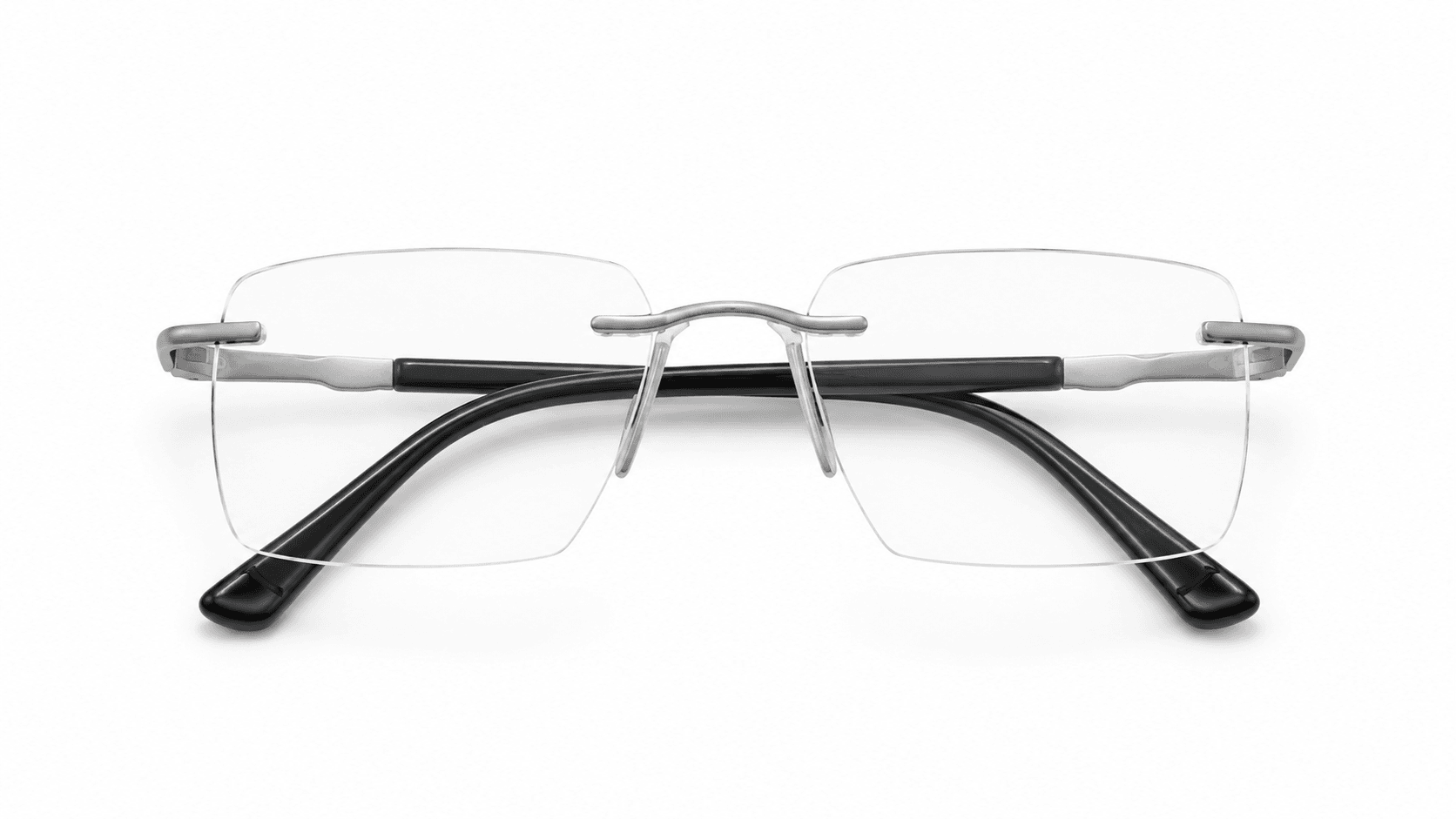 نظارة ريفال (Rival) الطبية بدون إطار (Rimless) بتصميم مستطيل باللون الفضي، مناسبة للجنسين وتلائم الوجوه الدائرية والبيضاوية والقلبية والمربعة.