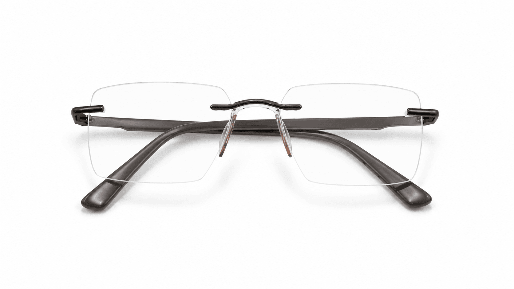 نظارة ريفال (Rival) الطبية بدون إطار (Rimless) بتصميم مستطيل باللون البرونز، مناسبة للجنسين وتلائم الوجوه الدائرية والبيضاوية والقلبية والمربعة.